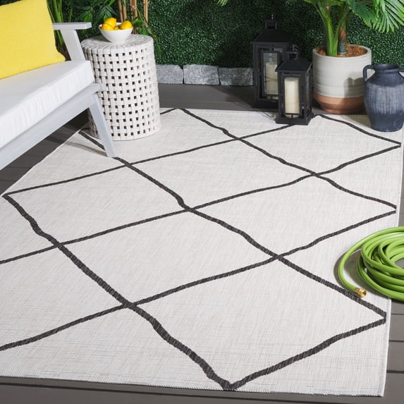 SAFAVIEH Courtyard Cohen Diamond Indoor/Outdoor Area Rug, Ivory/Black, 5'3" x 7'7"