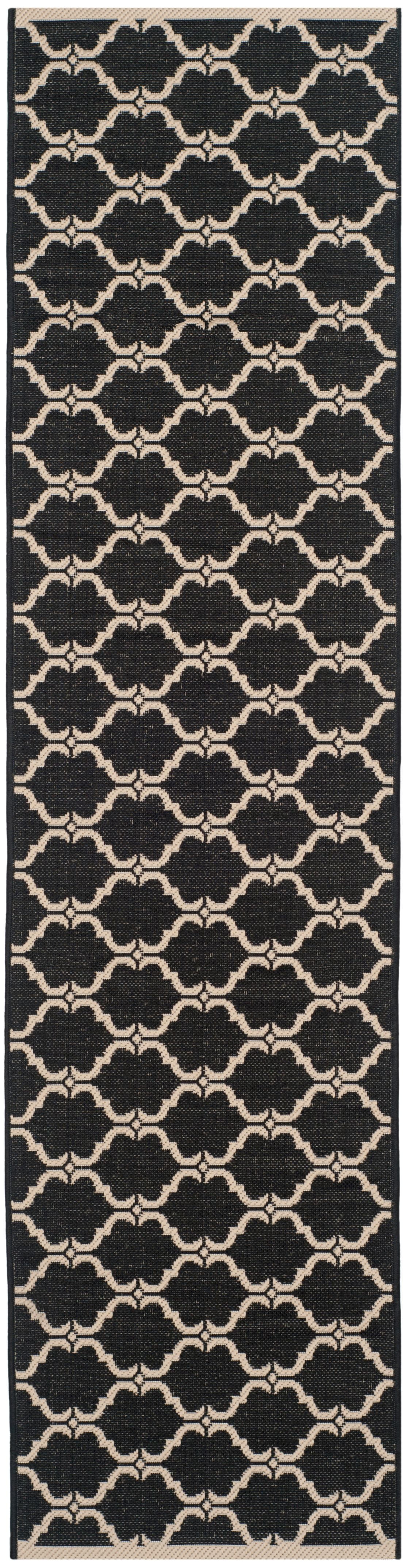 Courtyard Estelle 2'3" x 8' Black/Beige Synthetic Indoor/Outdoor Runner Rug