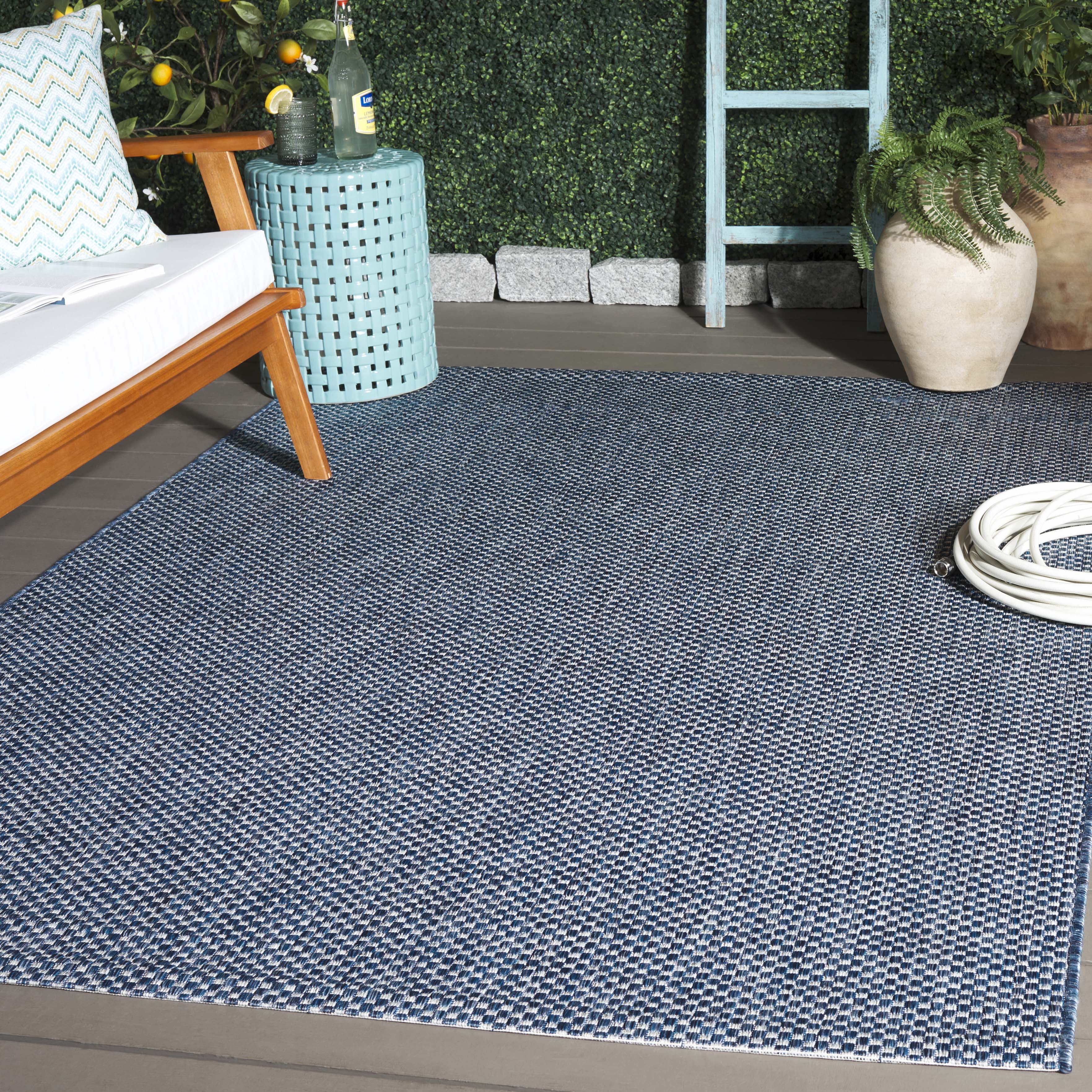 Safavieh Courtyard Finnian Solid Indoor/Outdoor Area Rug, Navy/Gray, 6'7" x 9'6"