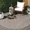 thumbnail image 1 of Safavieh Courtyard Finnian Solid Indoor/Outdoor Area Rug, Beige/Brown, 6'7" x 6'7" Round, 1 of 12