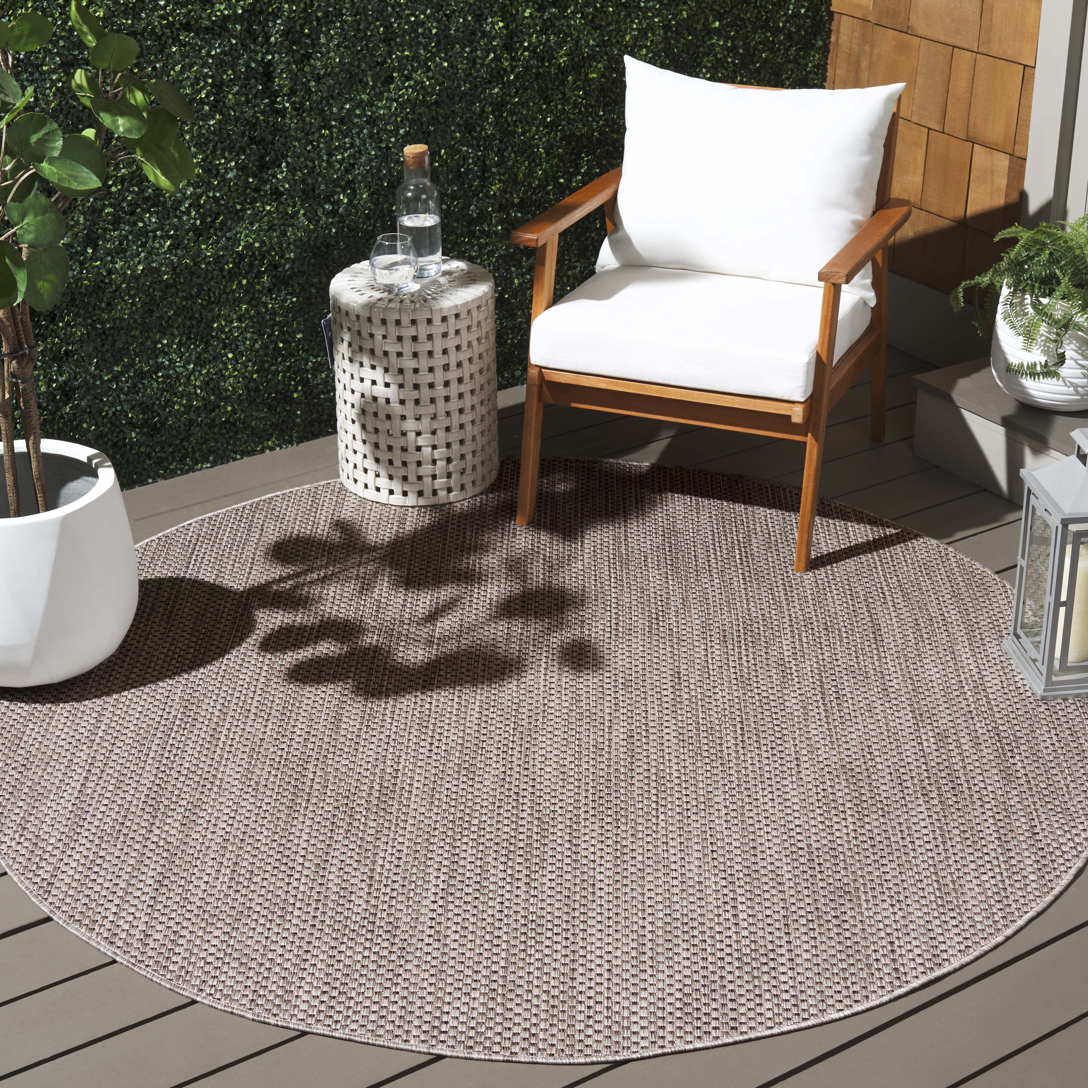 Safavieh Courtyard Finnian Solid Indoor/Outdoor Area Rug, Beige/Brown, 9' x 9' Round