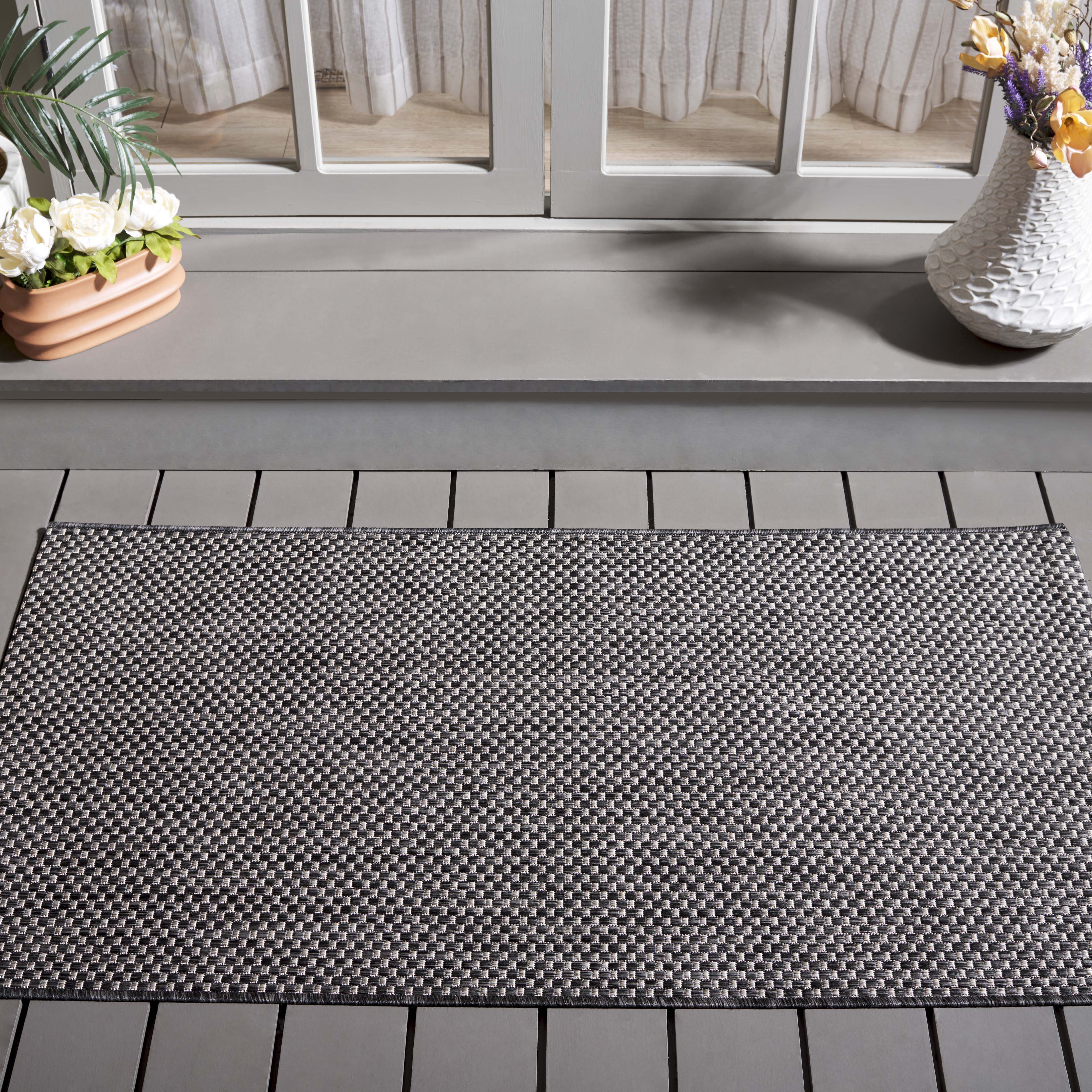 Courtyard Finnian Solid Indoor/Outdoor Area Rug, Black/Beige, 2' x 3'7"