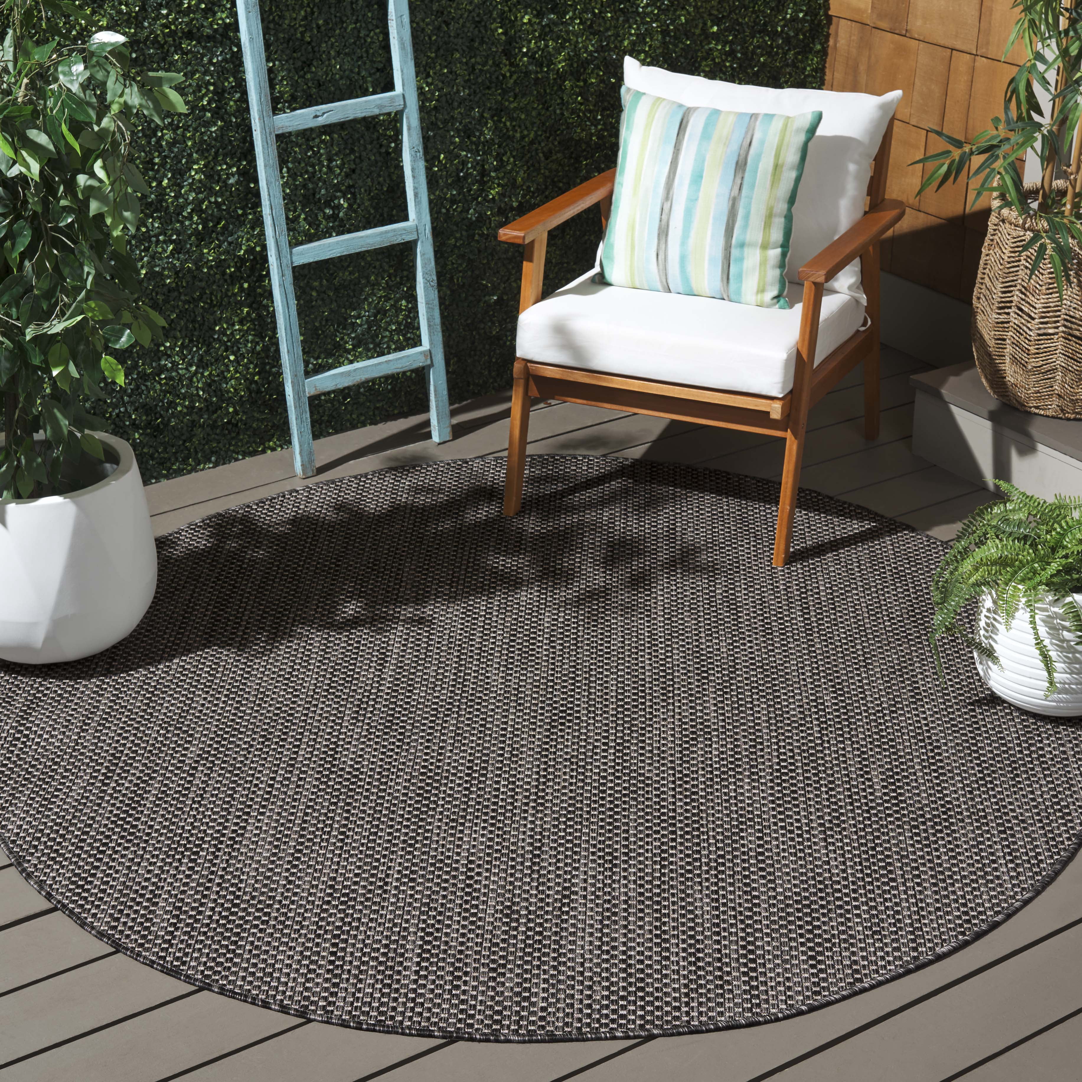 Safavieh Courtyard Finnian Solid Indoor/Outdoor Area Rug, Black/Beige, 9' x 9' Round