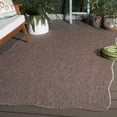 thumbnail image 1 of Safavieh Courtyard Finnian Solid Indoor/Outdoor Area Rug, Natural/Black, 6'7" x 9'6" Scalloped, 1 of 15