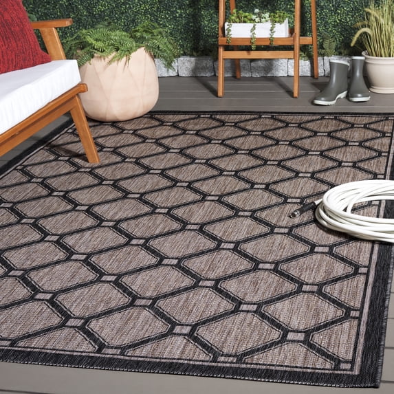 SAFAVIEH Courtyard Fisher Geometric Quatrefoil Indoor/Outdoor Area Rug, 5'3" x 7'7", Natural/Black