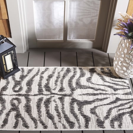 SAFAVIEH Courtyard Gerald Animal Indoor/Outdoor Area Rug, Ivory/Black, 2'7" x 5'