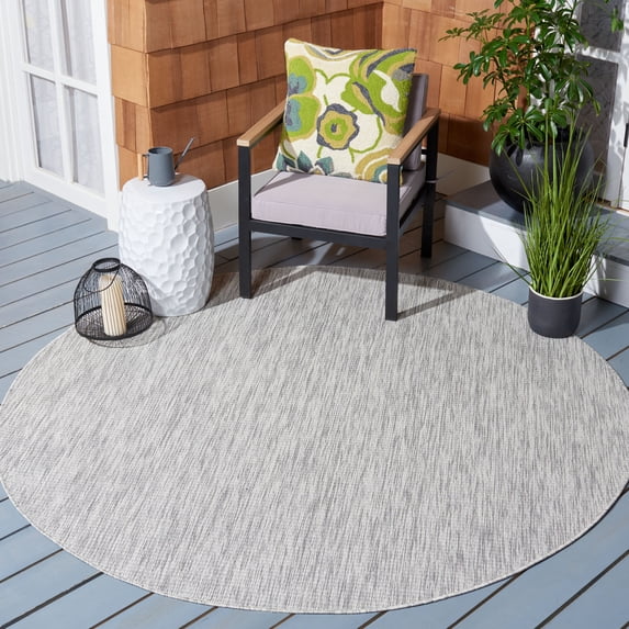 SAFAVIEH Courtyard Wayra Solid Indoor/Outdoor Area Rug, Grey/Grey, 6'7" x 6'7" Round