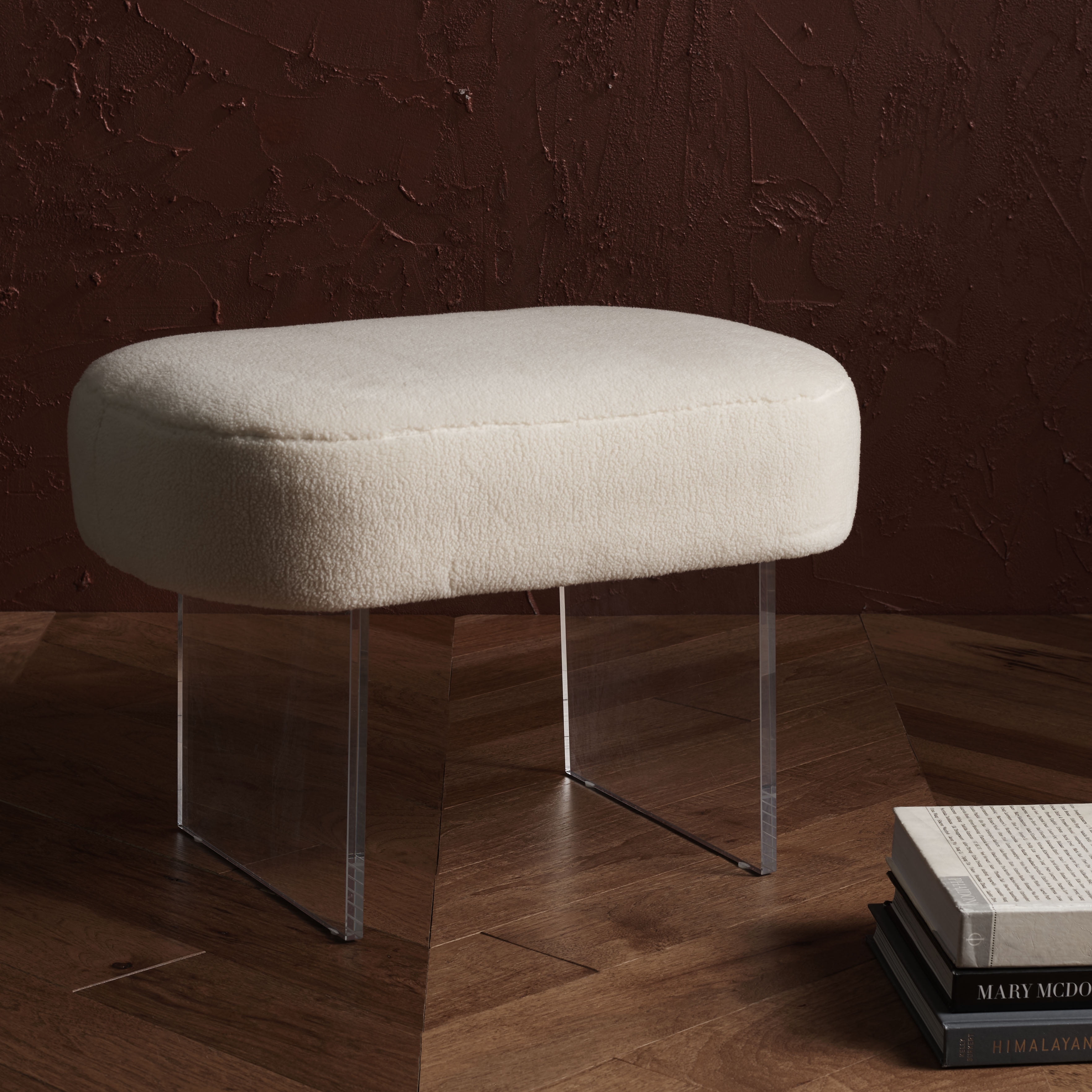 Ivory Faux Sheepskin Ottoman with Crystal-Clear Acrylic Legs