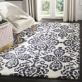 thumbnail image 1 of Safavieh Dip Dye Beaumont Distressed Wool Area Rug, Ivory/Navy, 5' x 8', 1 of 11