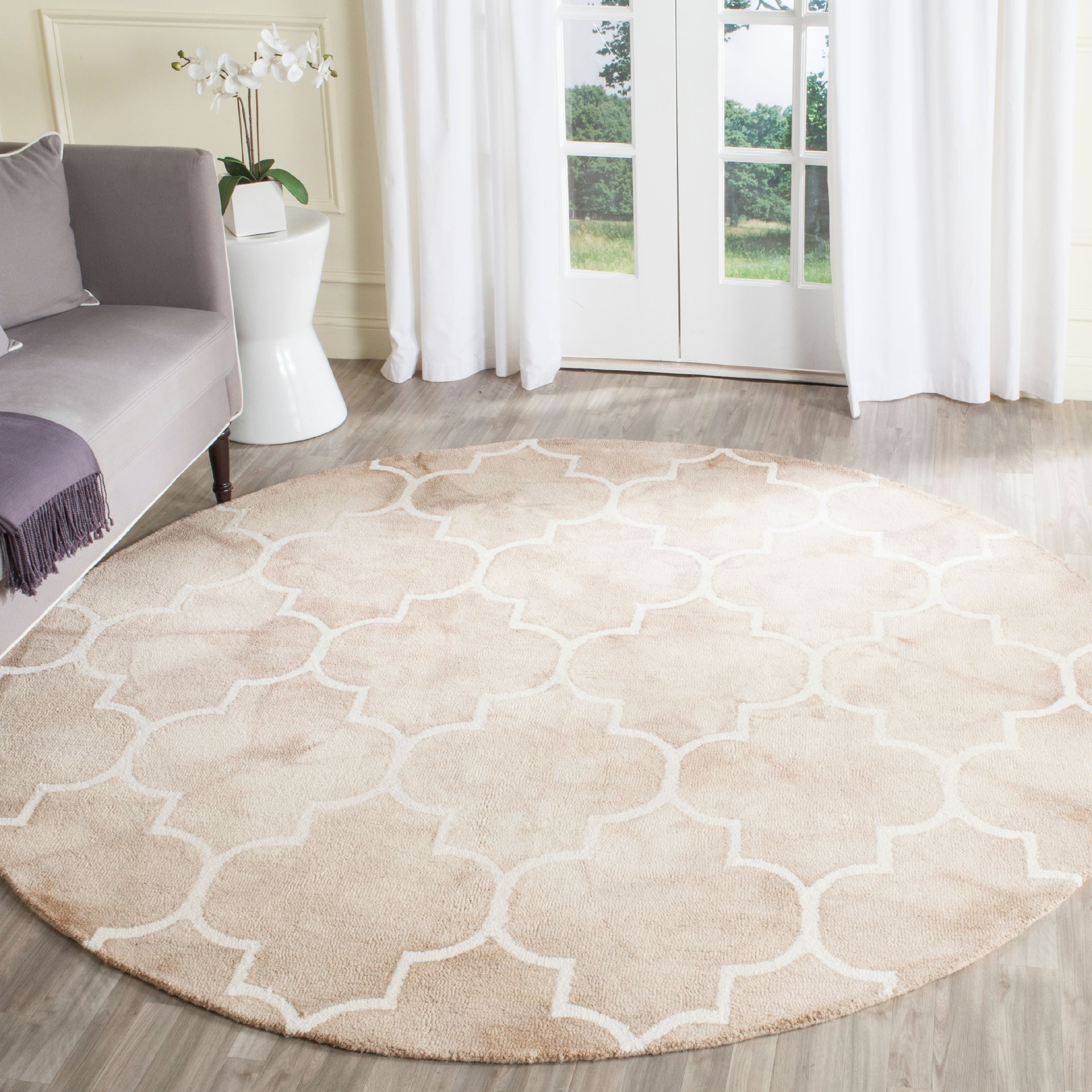 Ivory Elegance 7' Round Hand-tufted Wool Area Rug