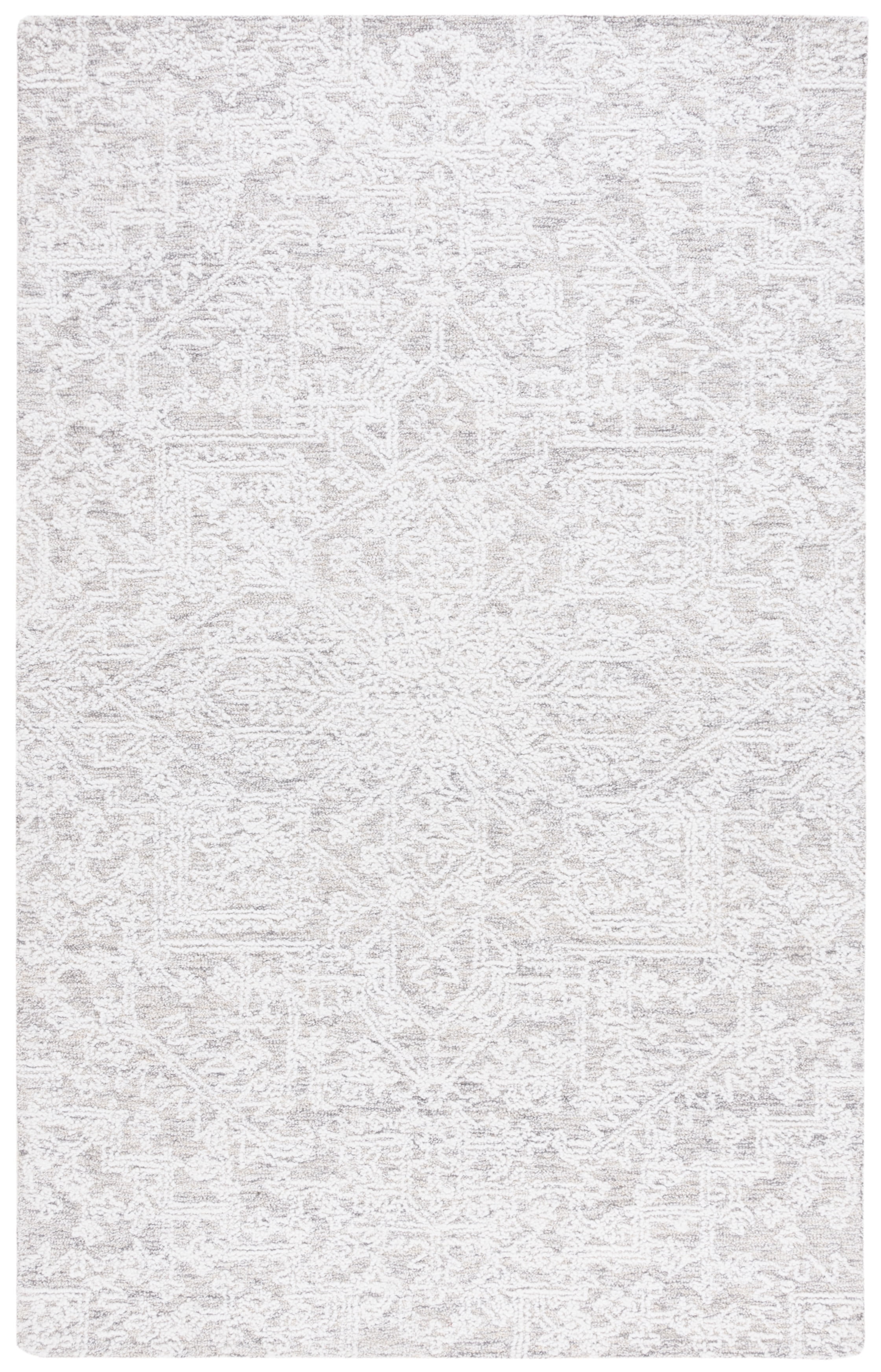 Ivory and Silver 8' x 10' Tufted Wool Area Rug