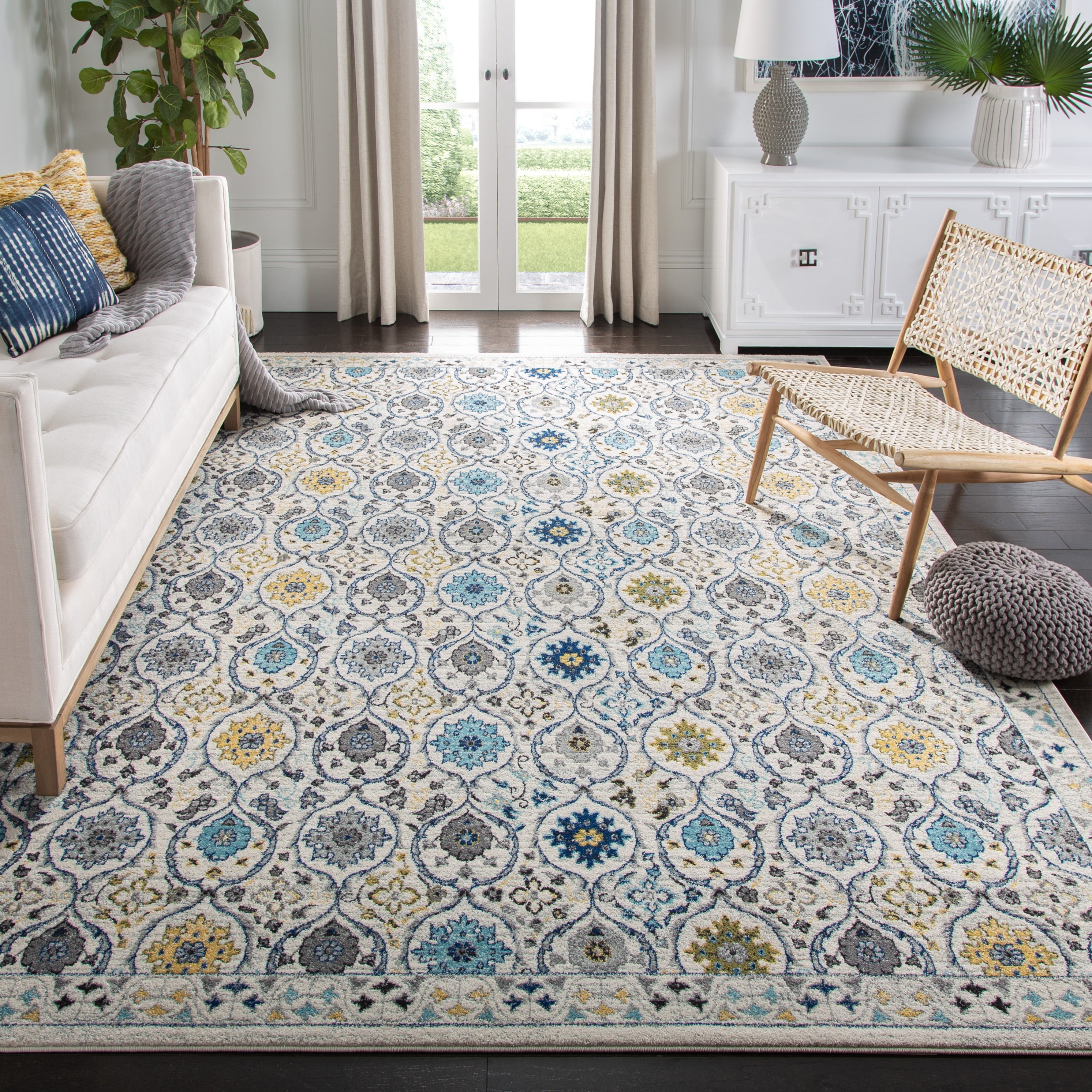 Ivory and Blue Reversible Synthetic Area Rug, 6'7" x 9'