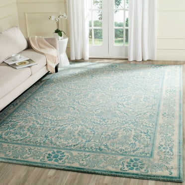 SAFAVIEH Evoke Lorna Traditional Bordered Area Rug, Ivory/Light Blue, 6'7" x 9'