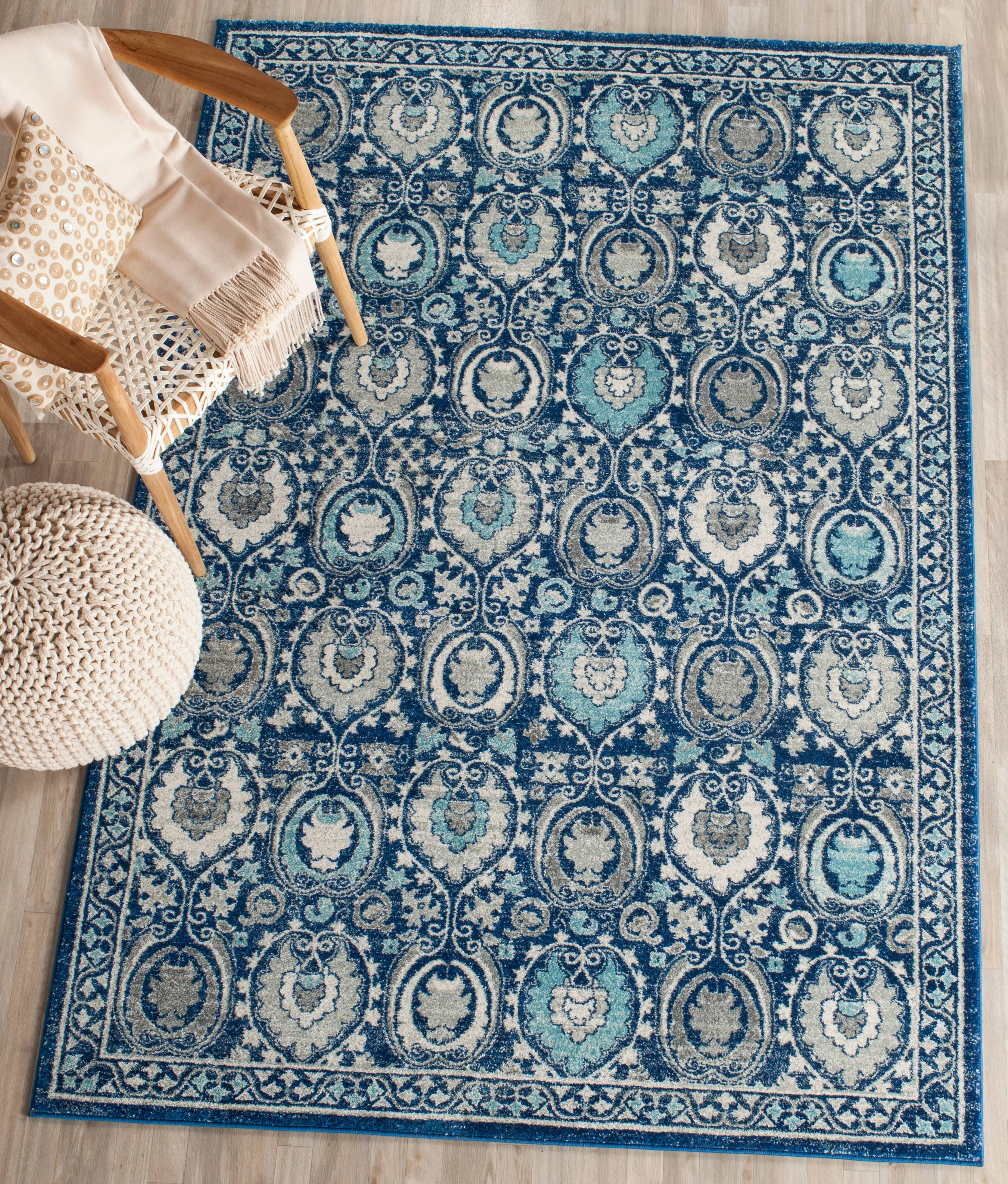 Evoke Blue and Ivory Synthetic 11' x 15' Area Rug