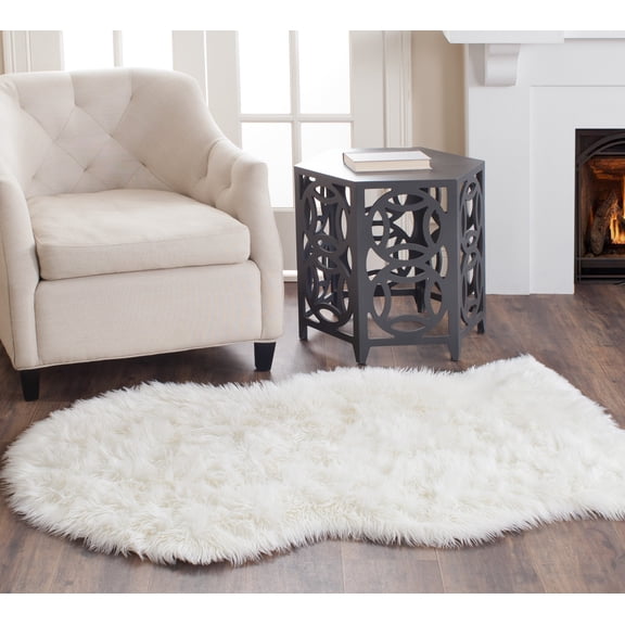 Safavieh Faux Sheep Skin Jadyn Animal Area Rug, Ivory, 4' x 6'