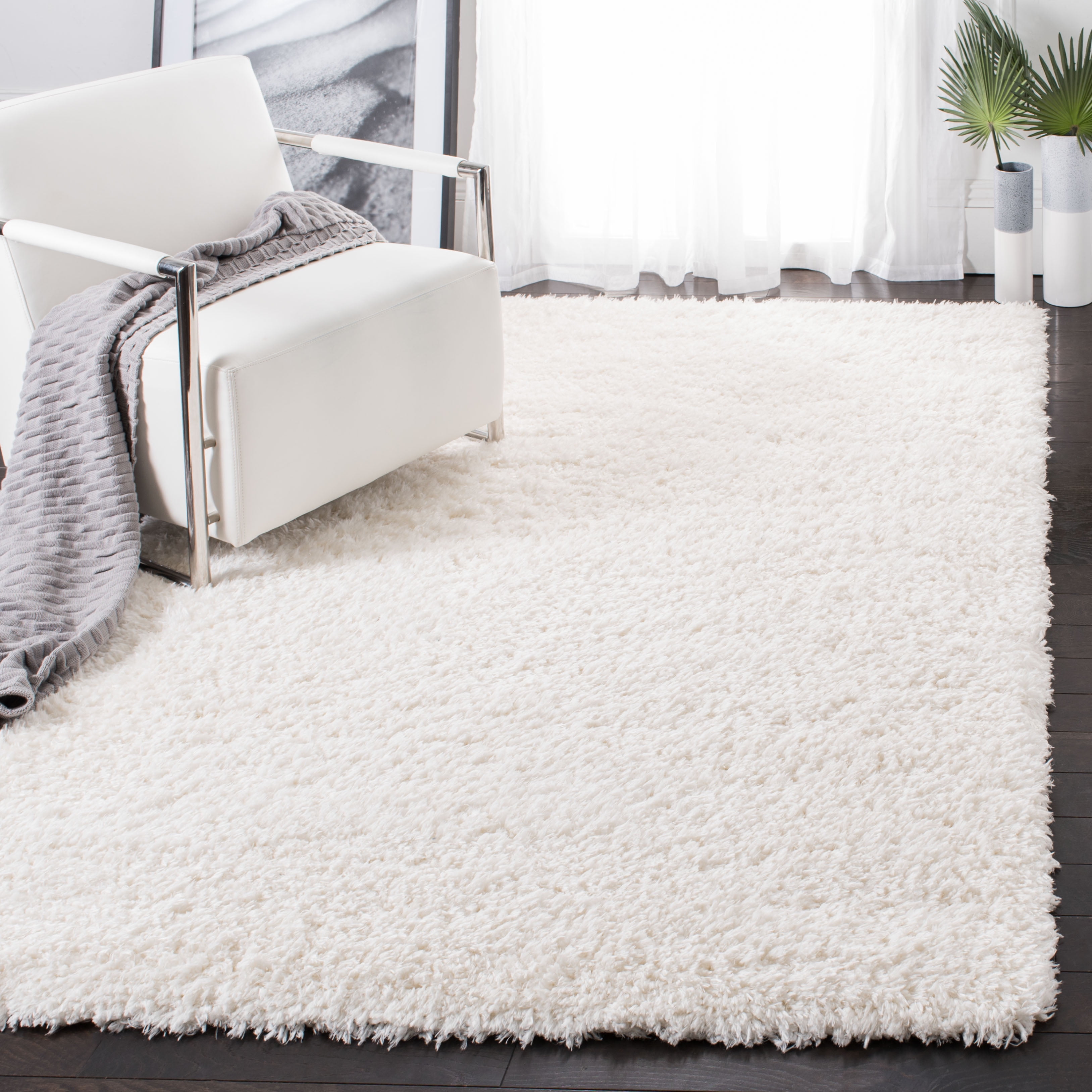 SAFAVIEH Flokati Lavena Solid Polyester Shag Area Rug, Ivory, 5'3" x 7'6"