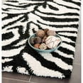 thumbnail image 1 of SAFAVIEH Florida Eleanor Animal Stripes Area Rug, Ivory/Black, 4' x 6', 1 of 11