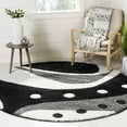 thumbnail image 1 of SAFAVIEH Florida Laidley Geometric Shag Area Rug, Black/Ivory, 5' x 5' Round, 1 of 7
