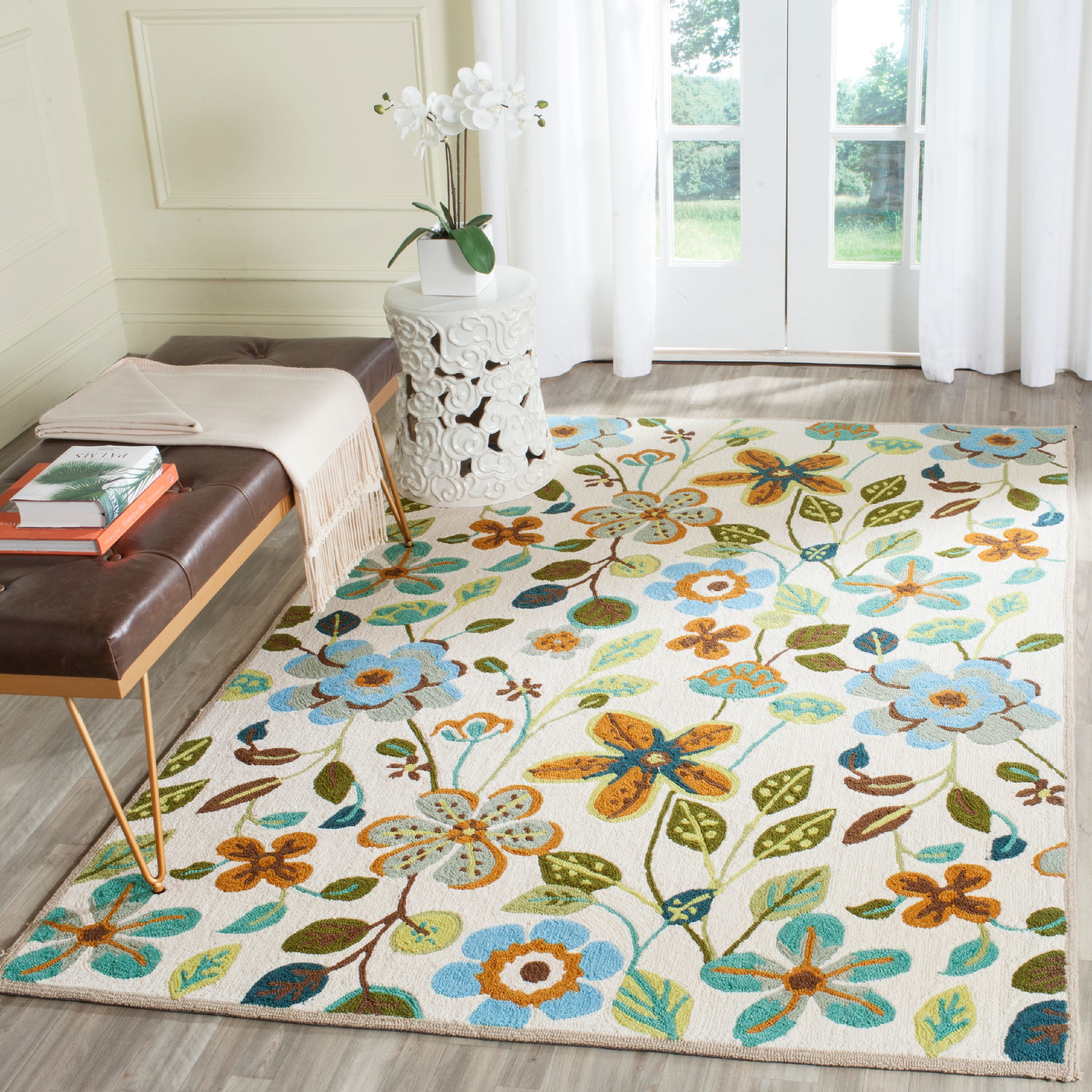 Ivory Floral Hand-Hooked Synthetic Area Rug 3'6" x 5'6"