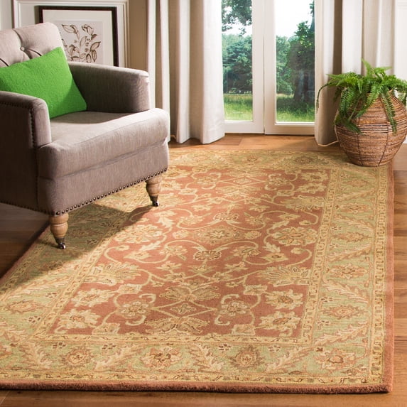 Safavieh Golden Jaipur Dreda Bordered Wool Area Rug, Rust/Green, 4'6" x 6'6" Oval