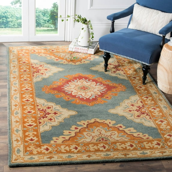SAFAVIEH Heritage Lewis Traditional Wool Area Rug, Blue/Rust, 6' x 9'