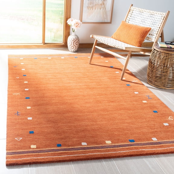 Safavieh Himalaya Charmaine Solid Wool Area Rug, Rust, 10' x 14'