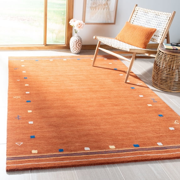 Safavieh Himalaya Charmaine Solid Wool Area Rug, Rust, 4' x 6'