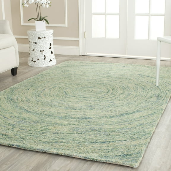 SAFAVIEH Ikat Hannan Geometric Circles Wool Area Rug, Ivory/Blue, 8'9" x 12'