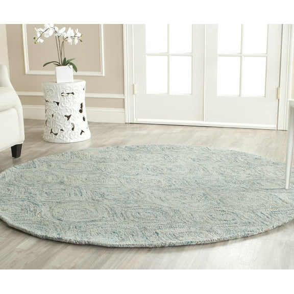 SAFAVIEH Ikat Kim Geometric Braided Wool Area Rug, Ivory/Sea Blue, 8' x 8' Round