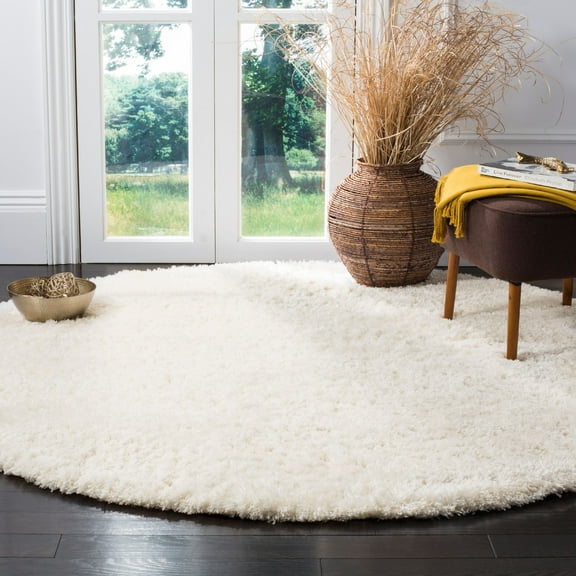 SAFAVIEH Indie Balfour Solid Polyester Shag Area Rug, Cream, 6'7" x 6'7" Round