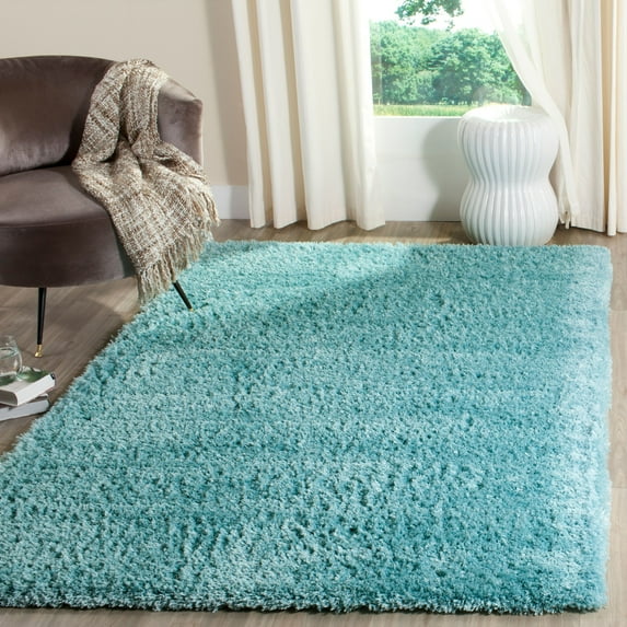 SAFAVIEH Indie Balfour Solid Polyester Shag Area Rug, Turquoise, 6'7" x 9'2"