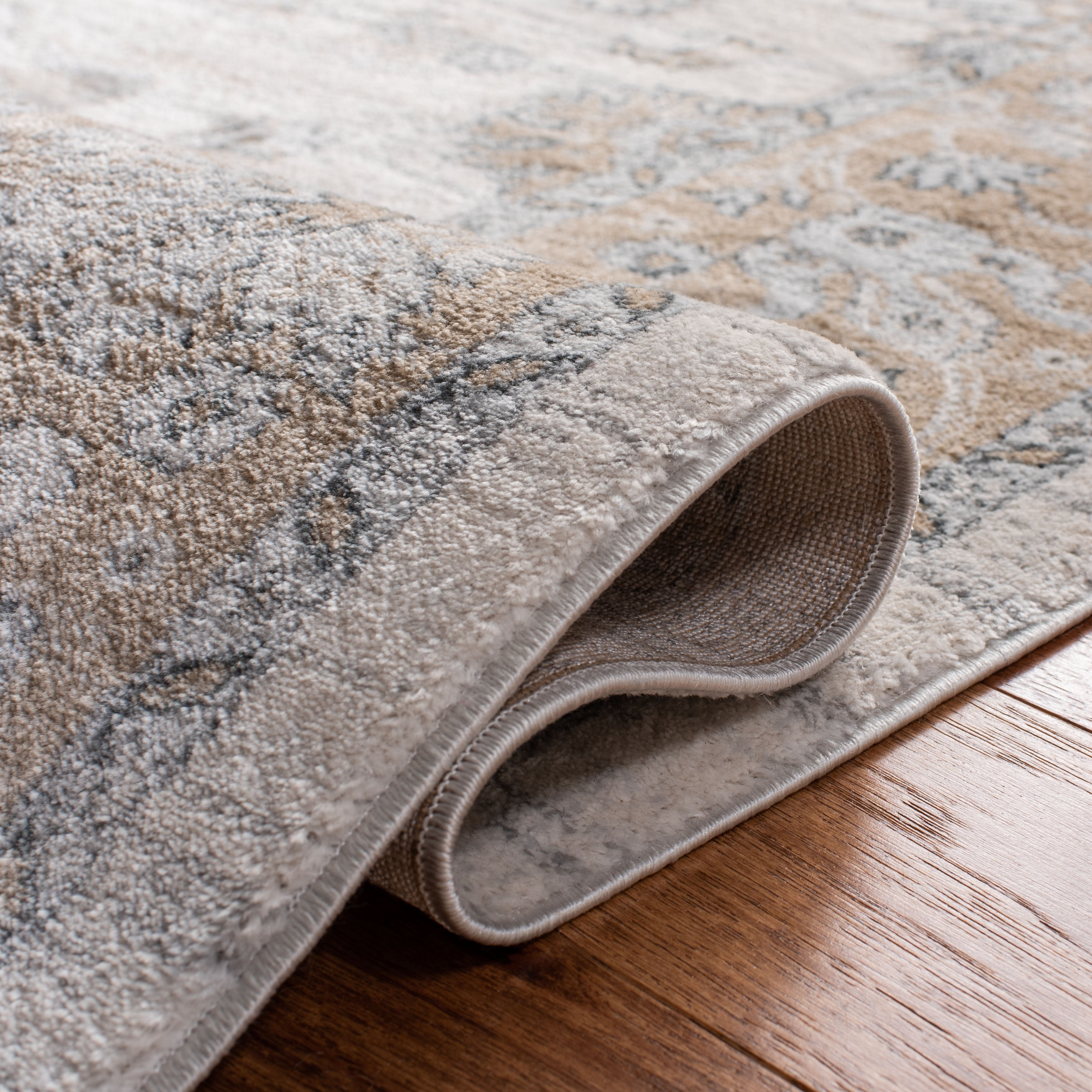 Isabella Cream and Beige Hand-Knotted Synthetic Area Rug