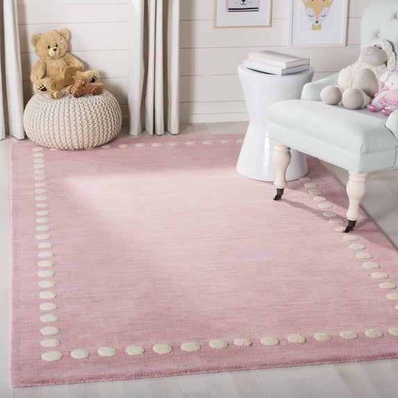 SAFAVIEH Kids Fiona Solid Bordered Wool Area Rug, Pink, 6' x 9'