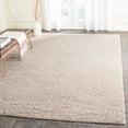 thumbnail image 1 of SAFAVIEH Laguna Neven Plush Solid Shag Area Rug, Sand, 6'7" x 9'6", 1 of 7