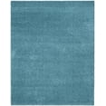 thumbnail image 1 of SAFAVIEH Laguna Neven Plush Solid Shag Area Rug, Turquoise, 6'7" x 9'6", 1 of 6