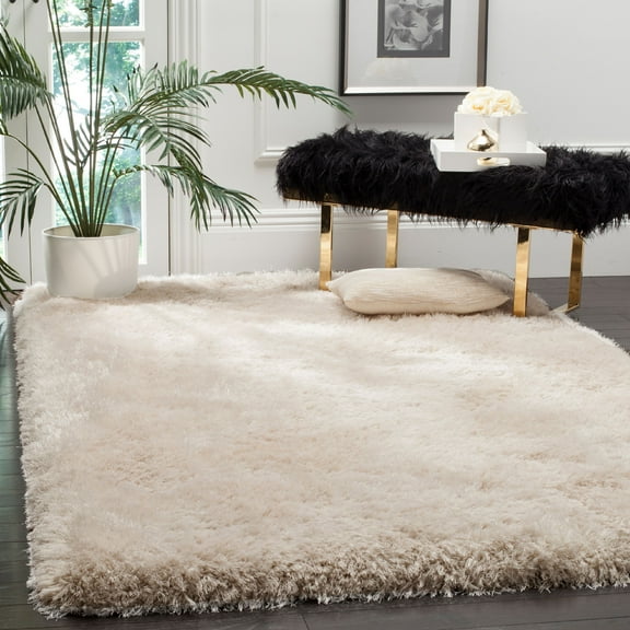 SAFAVIEH Luxe Paxton Solid Plush Polyester Shag Area Rug, Bone, 5' x 8'