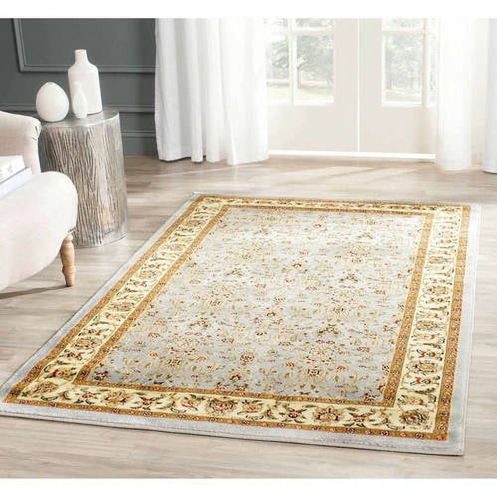 SAFAVIEH Lyndhurst Pearl Traditional Bordered Area Rug, Light Blue