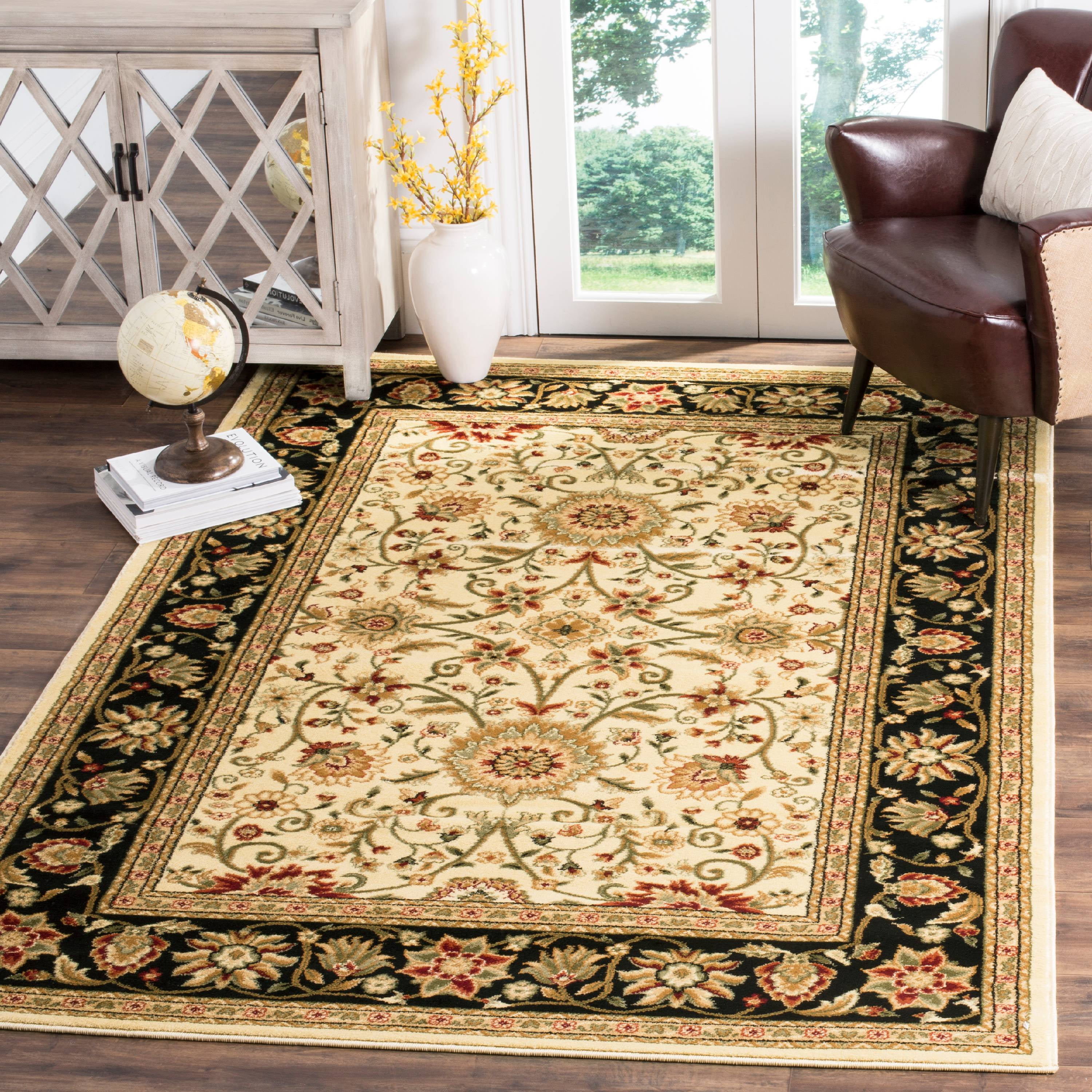 Ivory Tufted Handmade 6' x 9' Rectangular Synthetic Rug