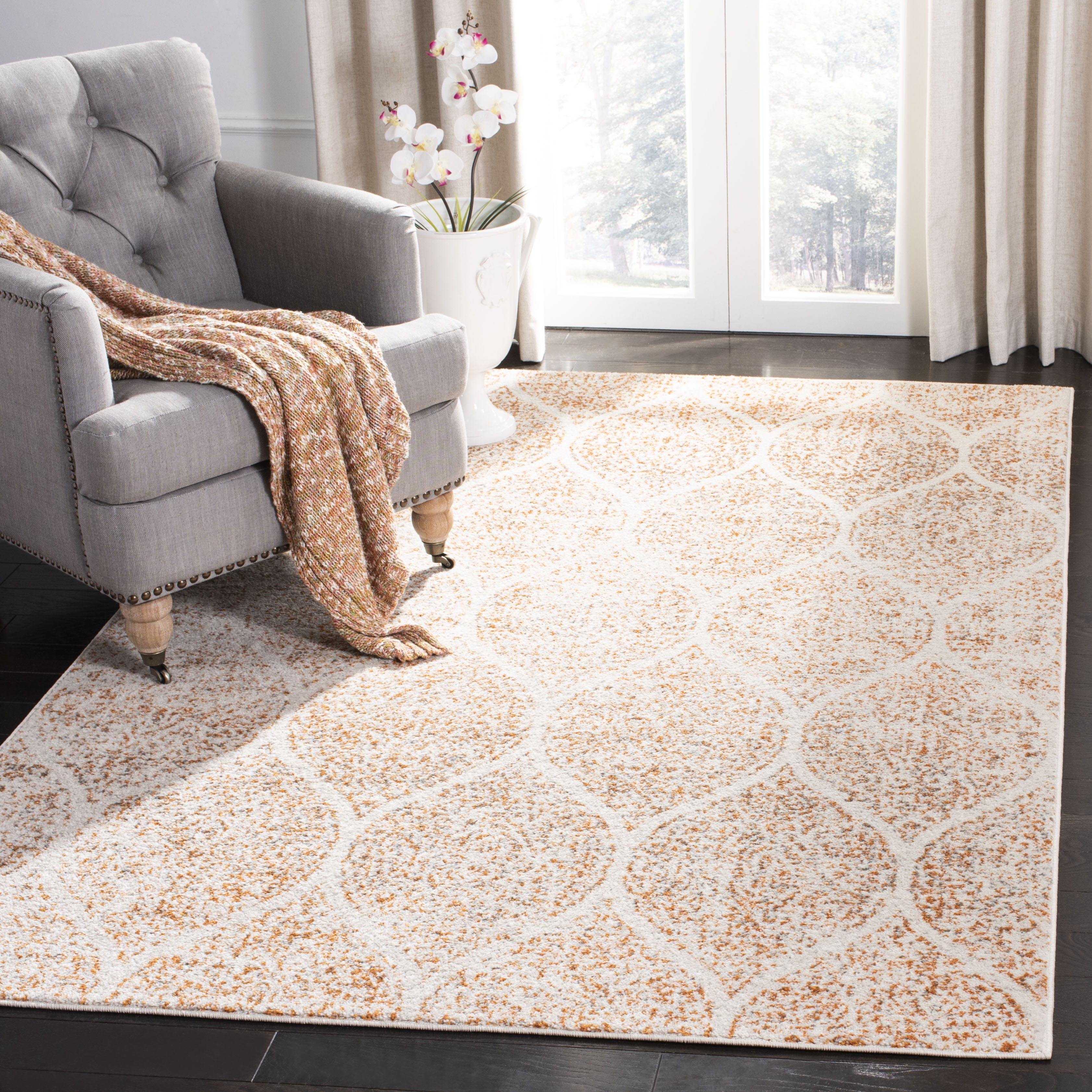 Ivory and Orange Synthetic Stain-Resistant Area Rug 3' x 5'
