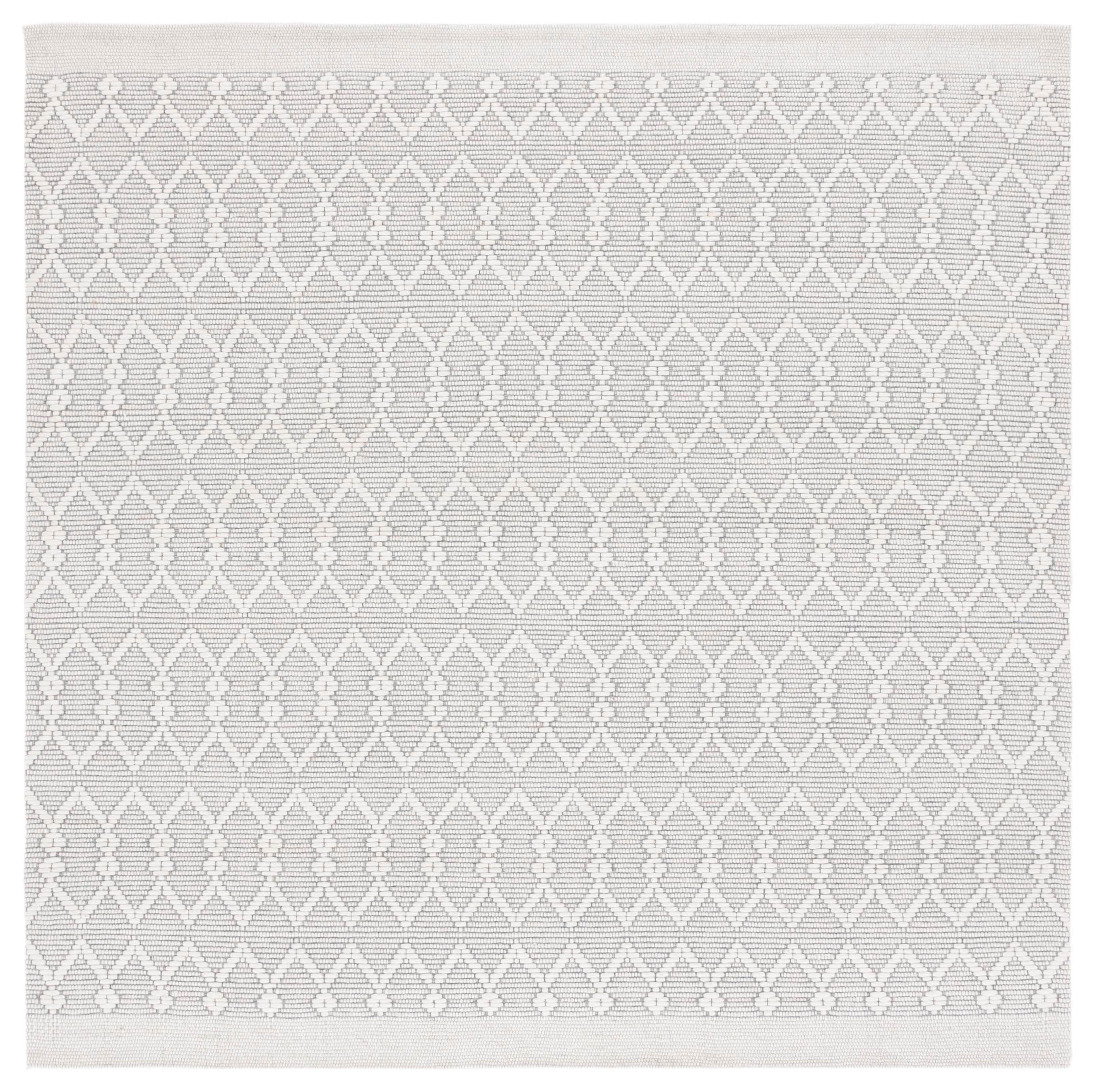 Ivory Hand-Tufted Wool and Synthetic Round Area Rug