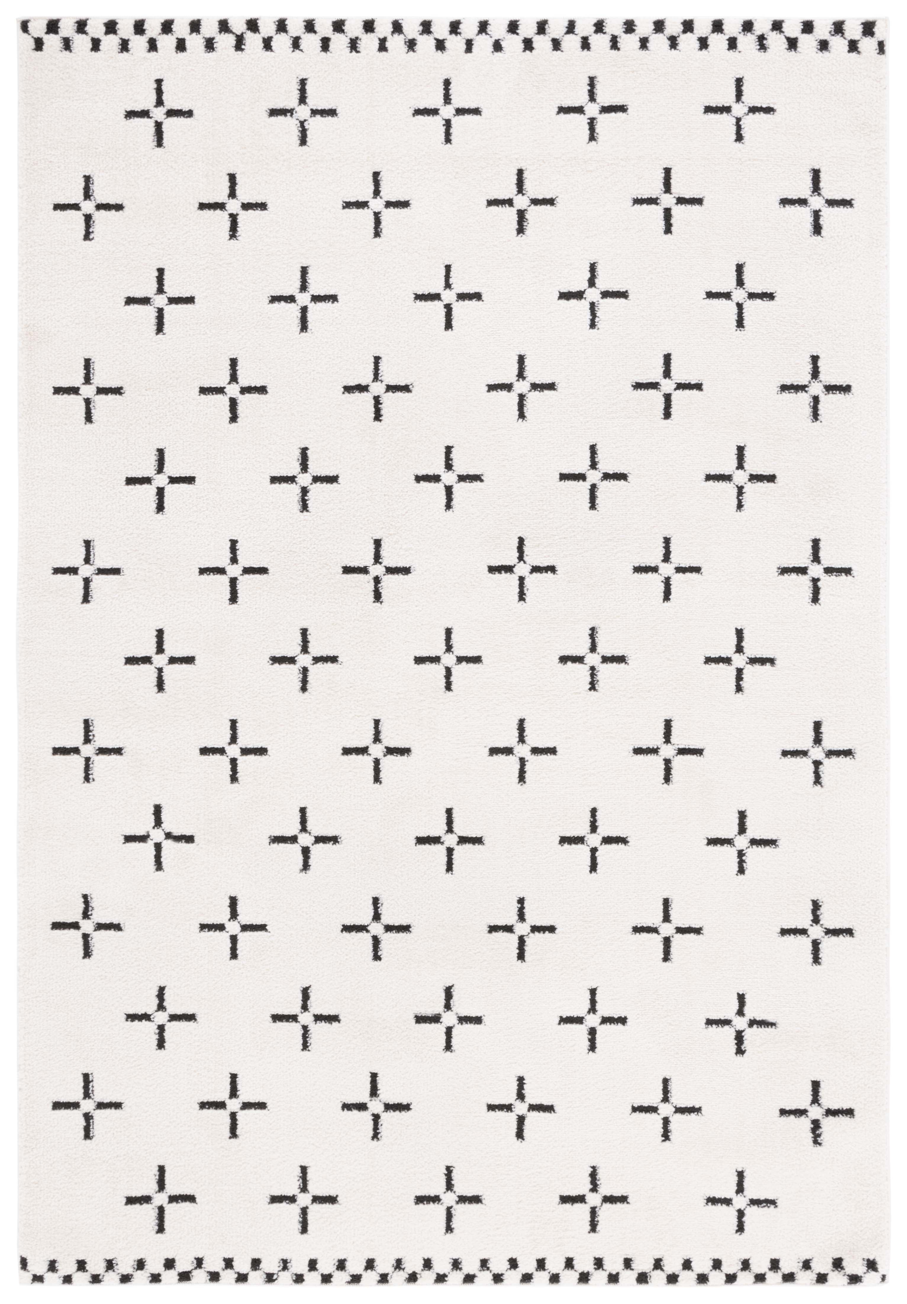 Ivory and Black Geometric Polyester 9' x 12' Area Rug