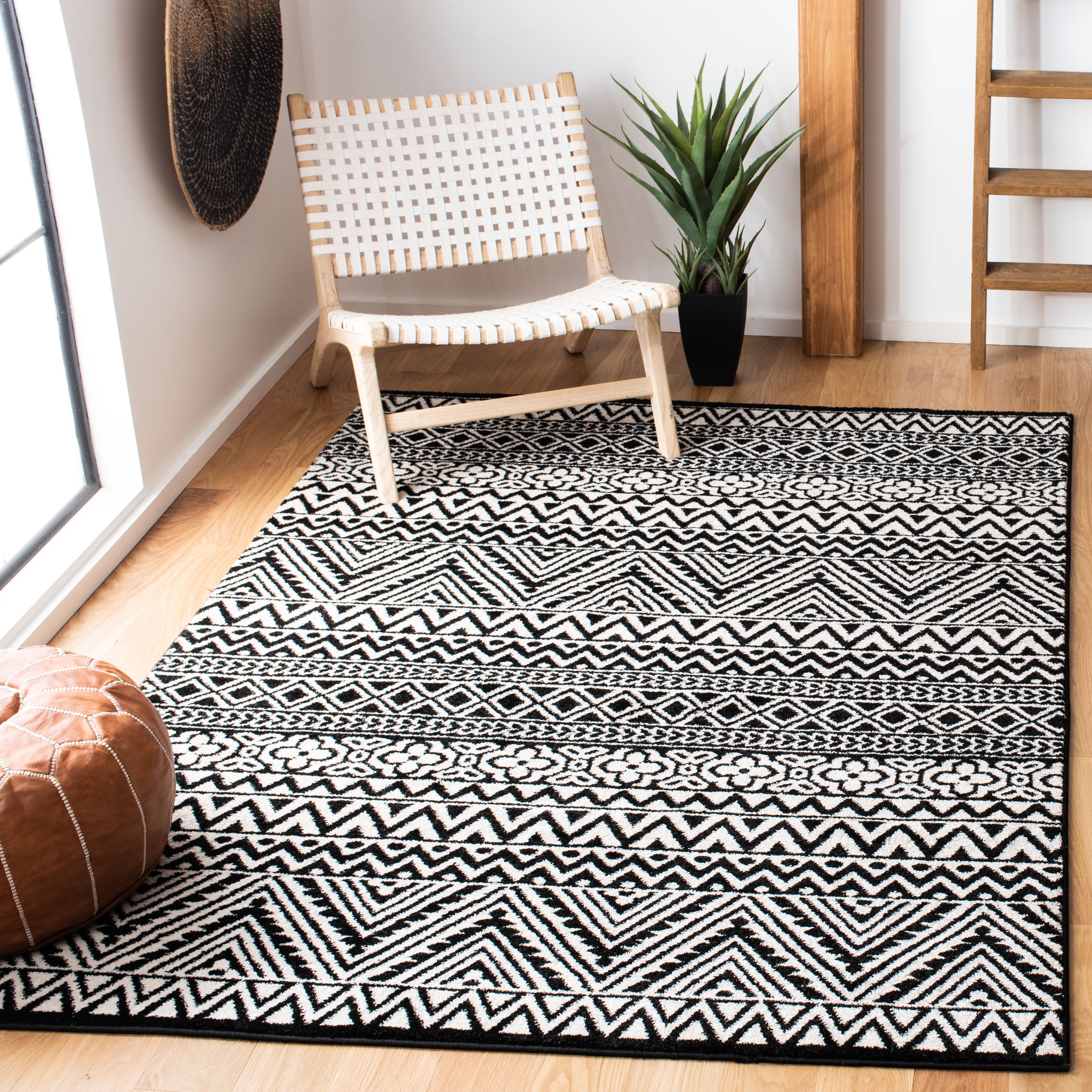 Ivory and Charcoal Geometric 9' x 12' Synthetic Area Rug