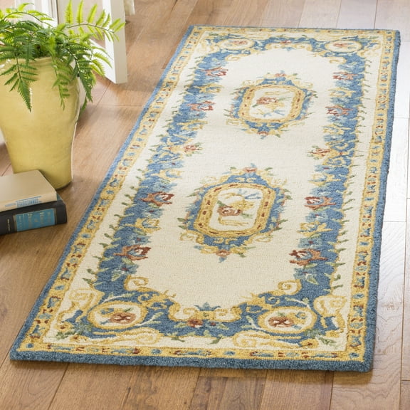 SAFAVIEH Micro-Loop Ibrahim Floral Bordered Wool Runner Rug, Cream/Blue, 2'3" x 7'