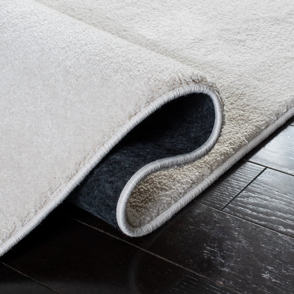 SAFAVIEH Plain and Solid Carleen Solid Plush Area Rug, Ivory, 8' x 10'