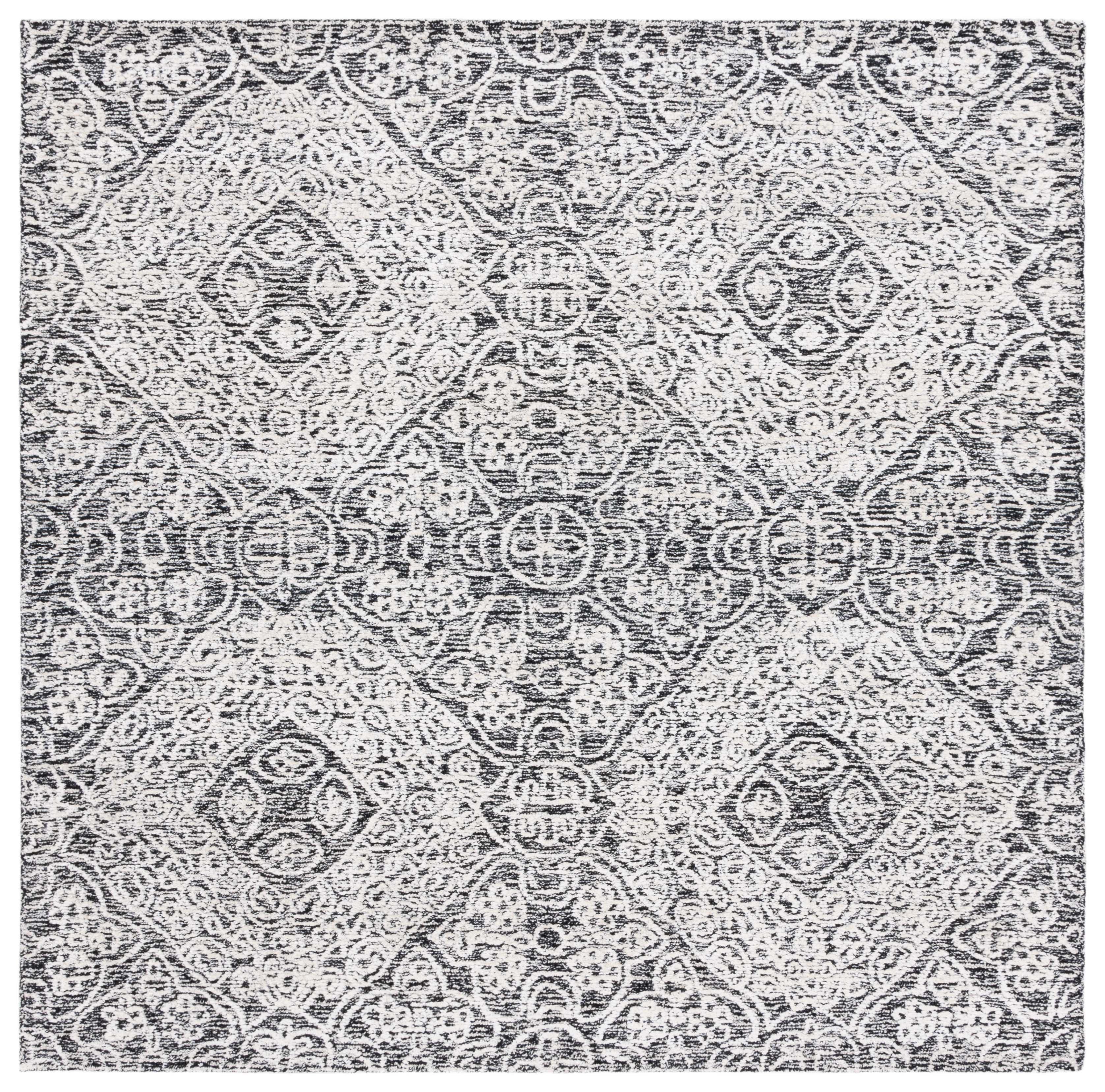 Handmade Black and Ivory Geometric Wool Area Rug