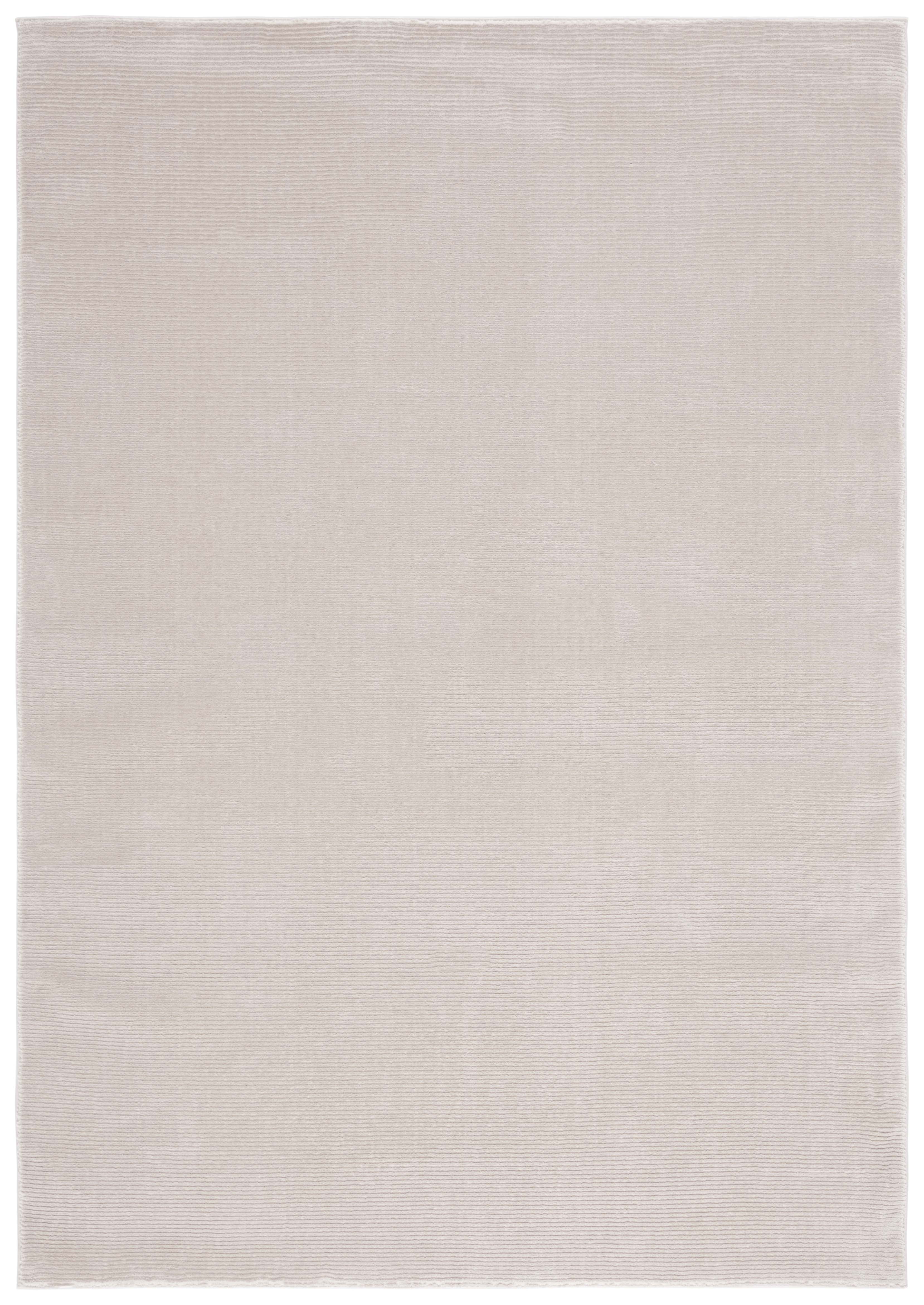Elegant Beige Synthetic 5'3" x 7'7" Easy-Care Area Rug