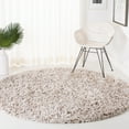 thumbnail image 1 of SAFAVIEH Rio Kynaston Solid Polyester Shag Area Rug, Beige/Ivory, 6' x 6' Round, 1 of 8