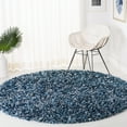 thumbnail image 1 of SAFAVIEH Rio Kynaston Solid Polyester Shag Area Rug, Navy/Ivory, 6' x 6' Round, 1 of 8