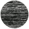 thumbnail image 1 of SAFAVIEH Rumi Barrett Striped Polyester Shag Area Rug, Black/Ivory, 6'7" x 6'7" Round, 1 of 7