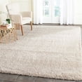 thumbnail image 1 of SAFAVIEH Santa Monica Chelsey Solid Shag Area Rug, Beige, 6'7" x 6'7" Square, 1 of 5
